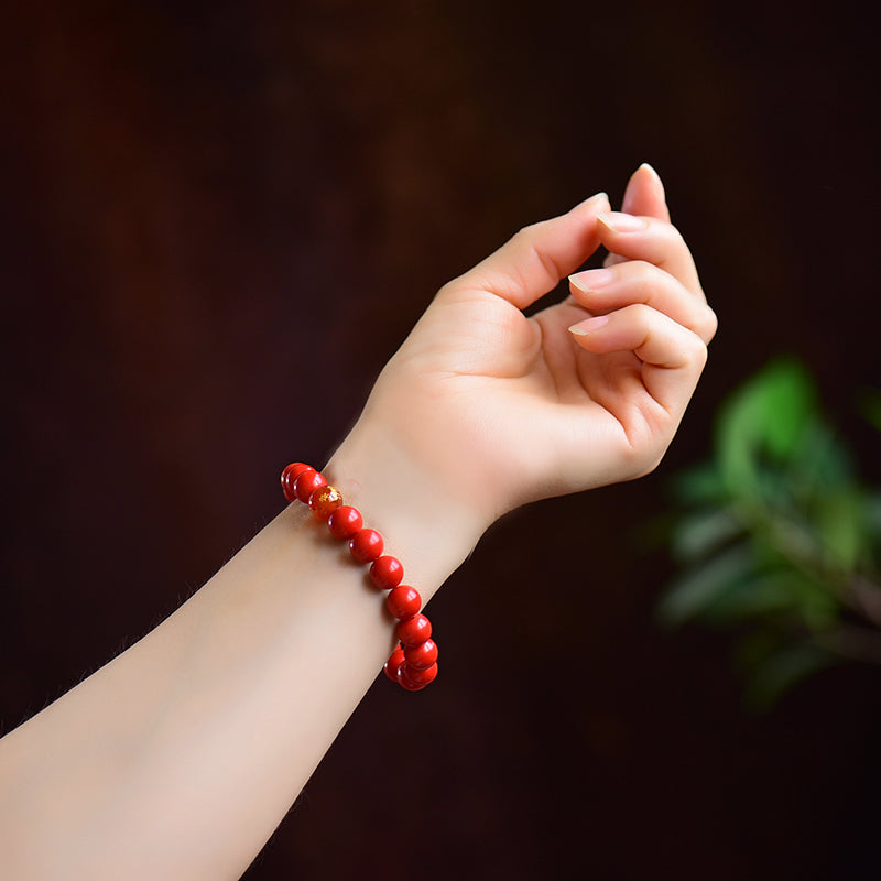 Armband aus simuliertem zinnoberrotem Harz mit rotem Achat-Akzent 