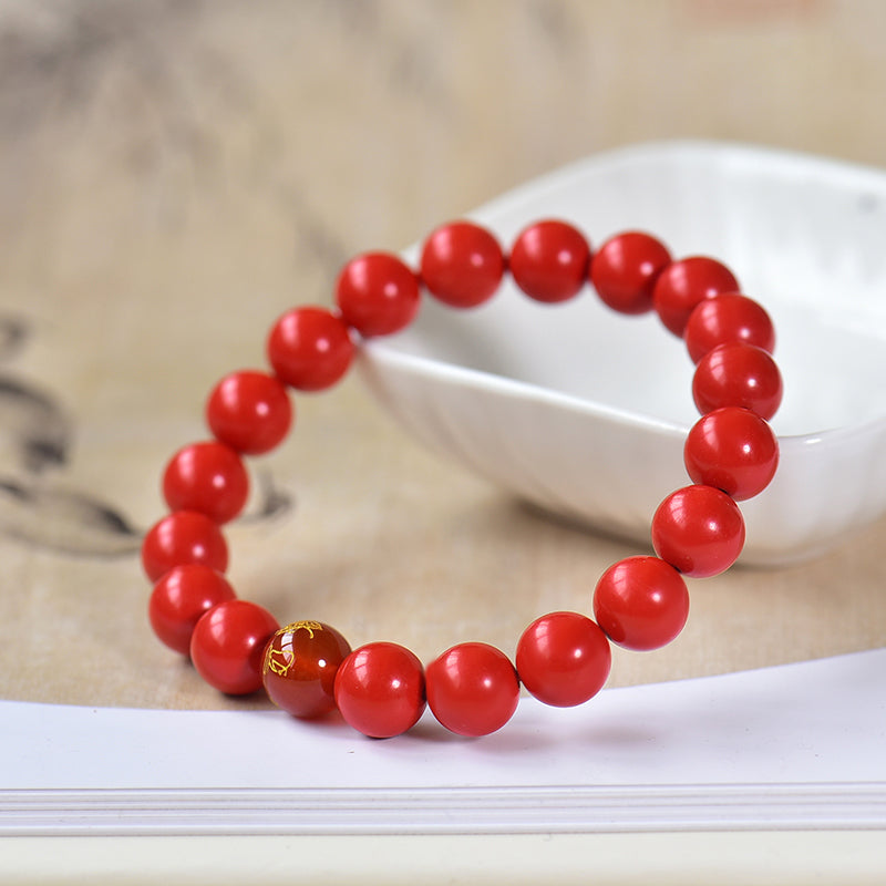 Armband aus simuliertem zinnoberrotem Harz mit rotem Achat-Akzent 