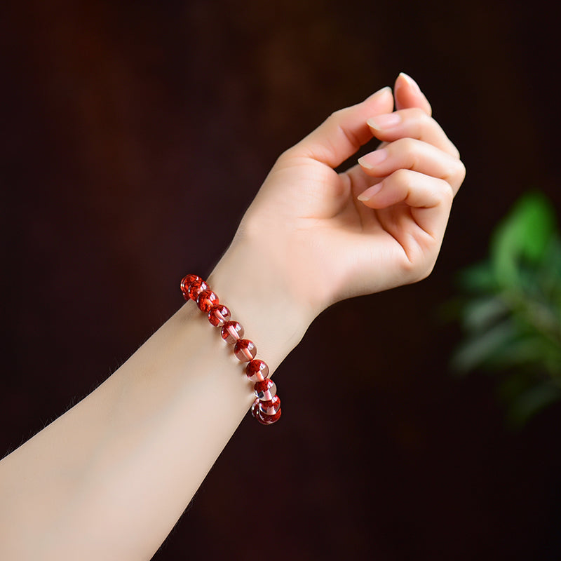 Durchscheinendes Harzarmband mit simuliertem zinnoberrotem Kern 