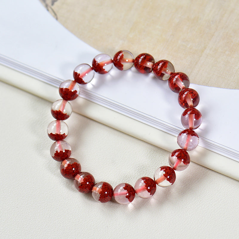 Durchscheinendes Harzarmband mit simuliertem zinnoberrotem Kern 