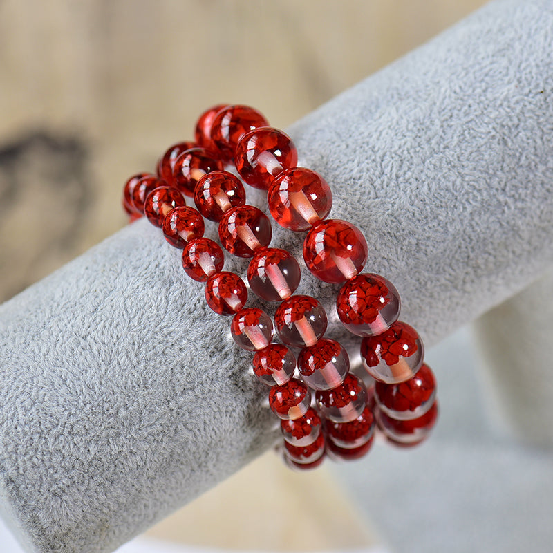 Durchscheinendes Harzarmband mit simuliertem zinnoberrotem Kern 