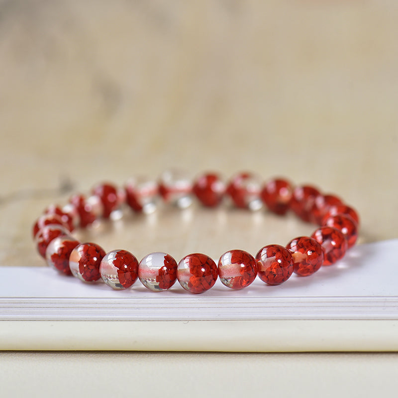 Durchscheinendes Harzarmband mit simuliertem zinnoberrotem Kern 